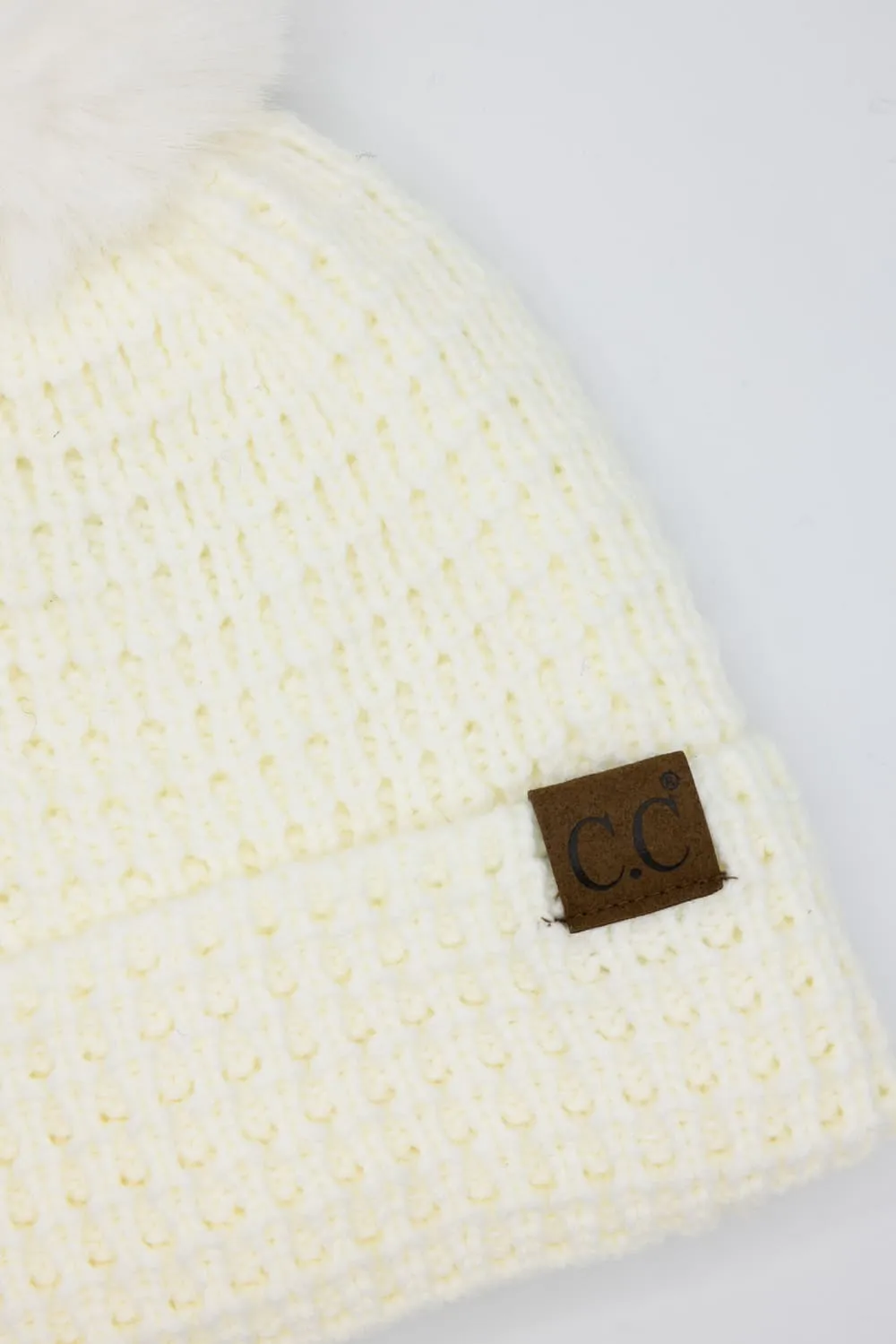 C.C. Waffle Knit Beanie with a Fur Pom for Women in Ivory | HTE0032-IVORY